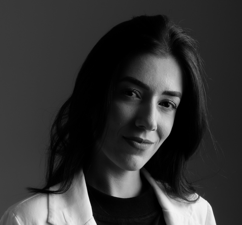 A black and white headshot of a woman